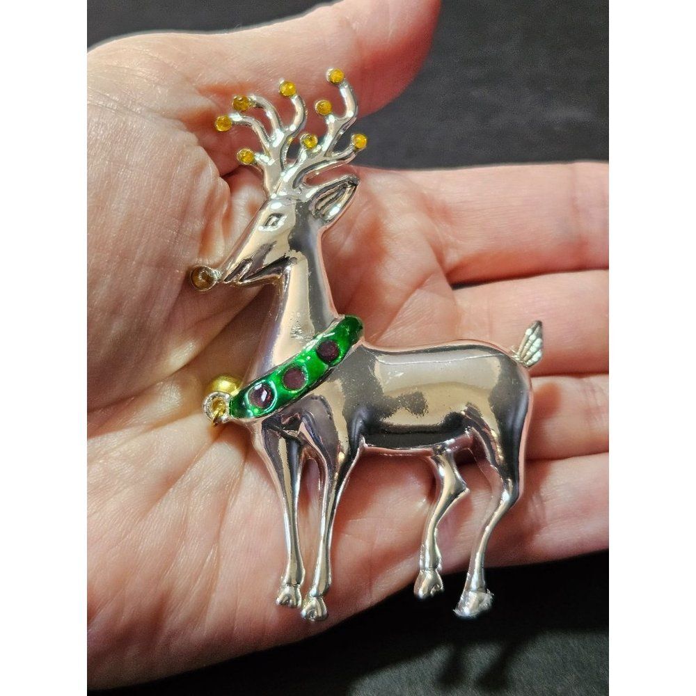 Vintage silver tone light up reindeer brooch